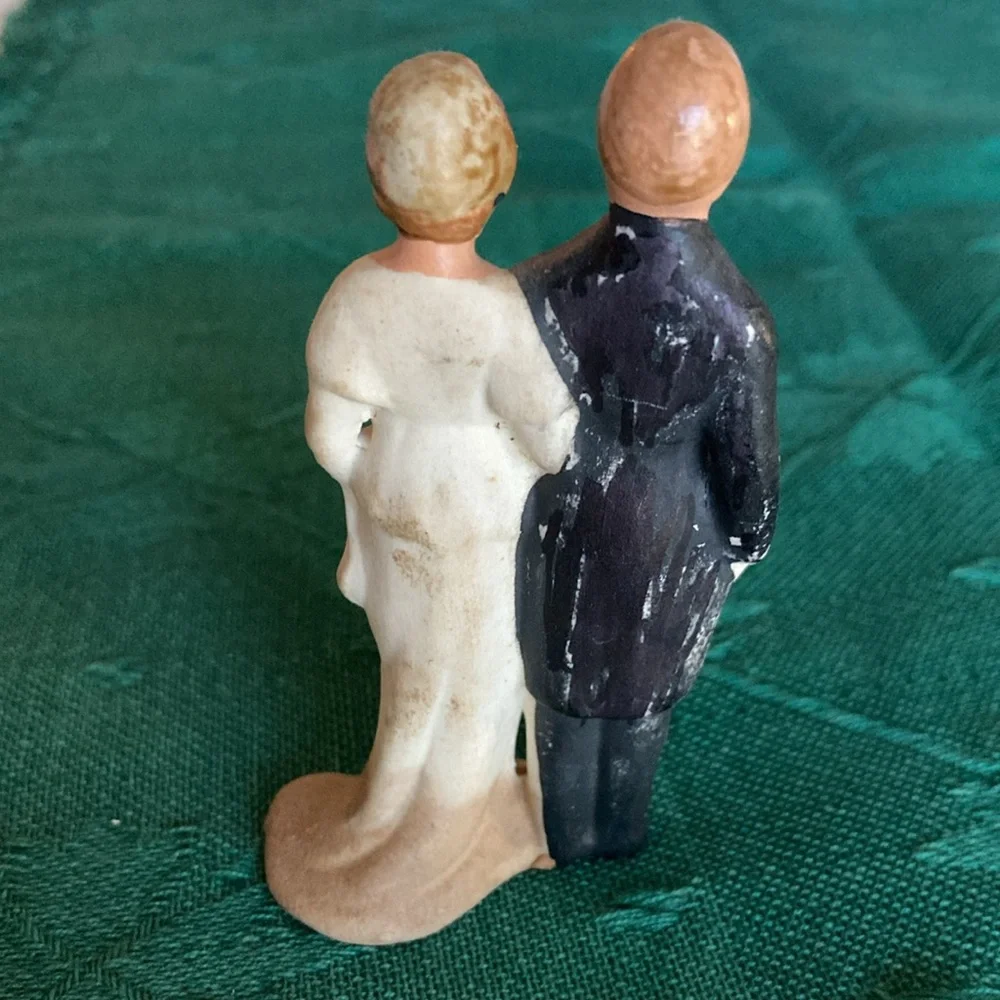 VINTAGE CAKE TOPPERS, 2 couples, 1 white porcelain w/gold, 1 rustic. $19